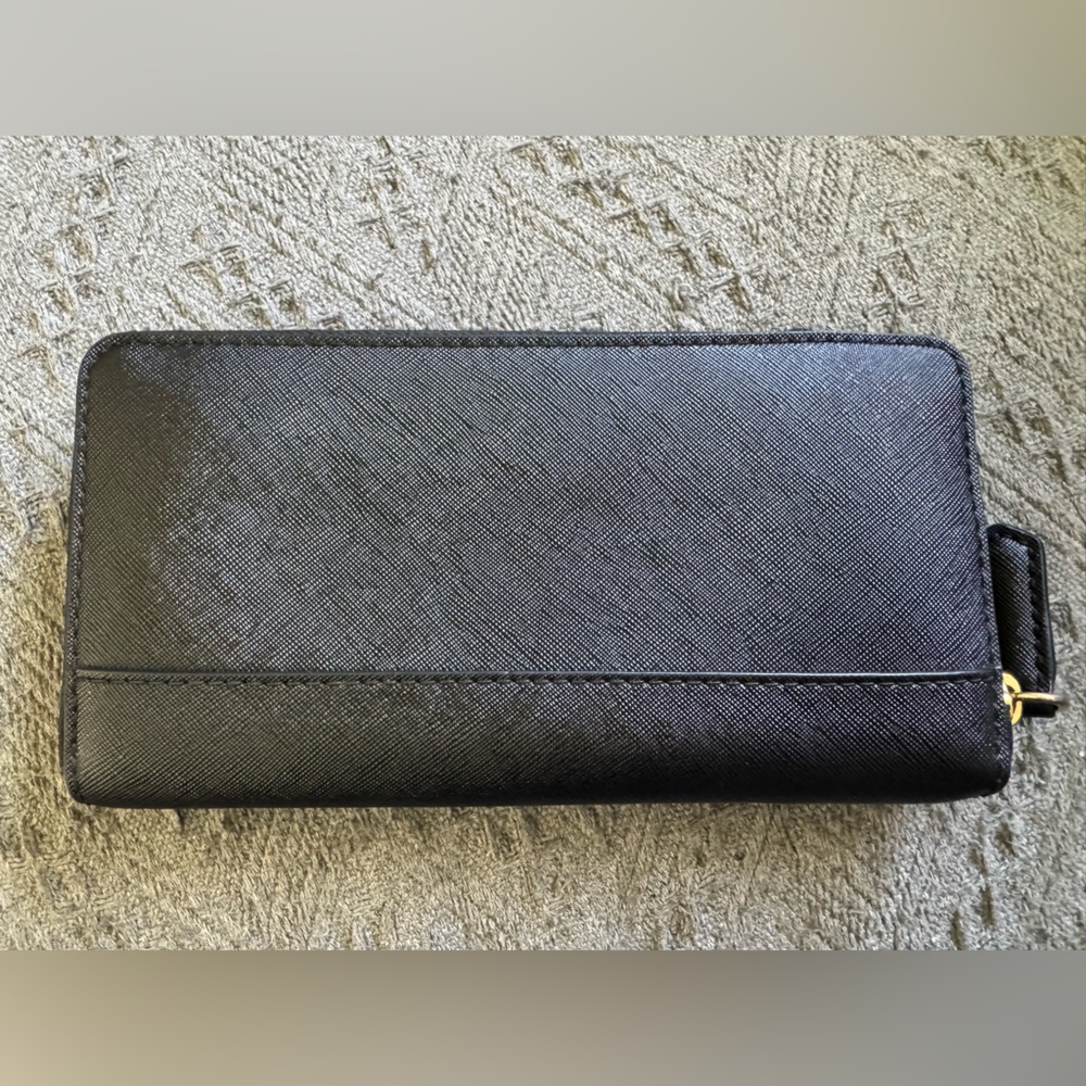 The Marc Jacobs Saffiano Leather Zip Around
Continental Wallet - $195 MSRP - Picture 3 of 8